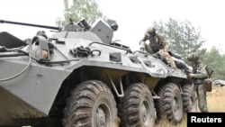 Borac Vagnera i beloruski vojnik na zajedničkom treningu u okolini Bresta, 20. jul 2023.