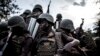 Basoda ya Mampinga ma RDC, FARDC, na manduki ma bango na motuka na na nzela ya bitumba na ba M23 na Oicha, territoire ya Beni, Nord-Kivu, 7 sanza ya zomi 2018.