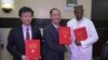  Firaministan gwamnatin rikon kwarya Ali Lamine Zeine da shugaban CNPC China Zhou Zuokun