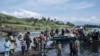 Basoda bazali kosunga bakim ibitumba komata na bwato na libongo pene na Minova, Sud-Kivu, 10 sanza ya misato 2024.