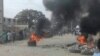 Protesto contra mau estrado das estradas no bairro Uíge, em Luanda, Angola, 15 Fevereiro 2023