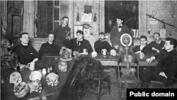 Members of the Whitechapel Club pose at Koster's Saloon, Chicago, Illinois, circa 1890-1895.