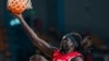 Al Ahly player Anunwa Omotaki puts the ball in the net against Capetown Tigers in the BAL league. (Photo by NBAE/Getty Images).
