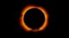 FILE - Photo of an annular solar eclipse taken by the solar optical telescope Hinode as the moon came between it and the sun. (JAXA/NASA)