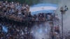 Argentine soccer fans celebrate their team's World Cup victory over France in Buenos Aires, Argentina, Dec. 18, 2022.