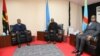 Presidentes João Lourenço, de Angola (esq), Paul Kagame, do Ruanda (cen) e Felix Tshisekedi, da RDC, Luanda, 21 Fevereiro 2020