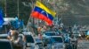 Partidarios del candidato de la oposición a gobernador, Sergio Garrido, durante acto en Barinas, Venezuela, el 6 de enero de 2022.