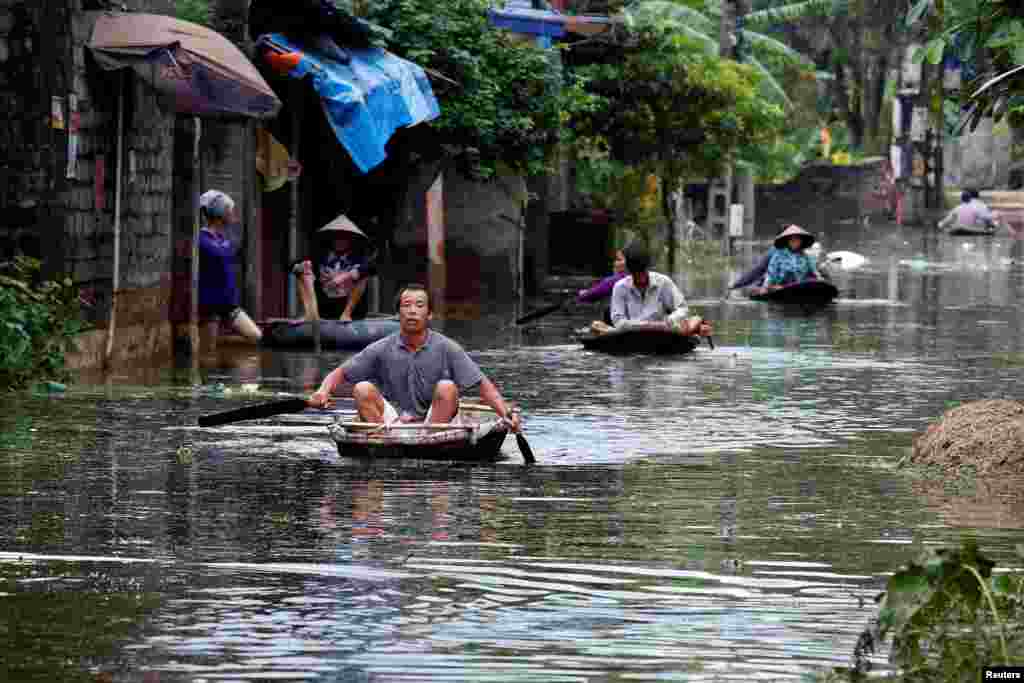 Mazuna yankin Hanoi, a kasar Vietnam, sun gamu da ambaliyar ruwan sama 