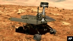 Archivo - En esta ilustración divulgada por NASA se ve la sonda Opportunity en la superficie de Marte.