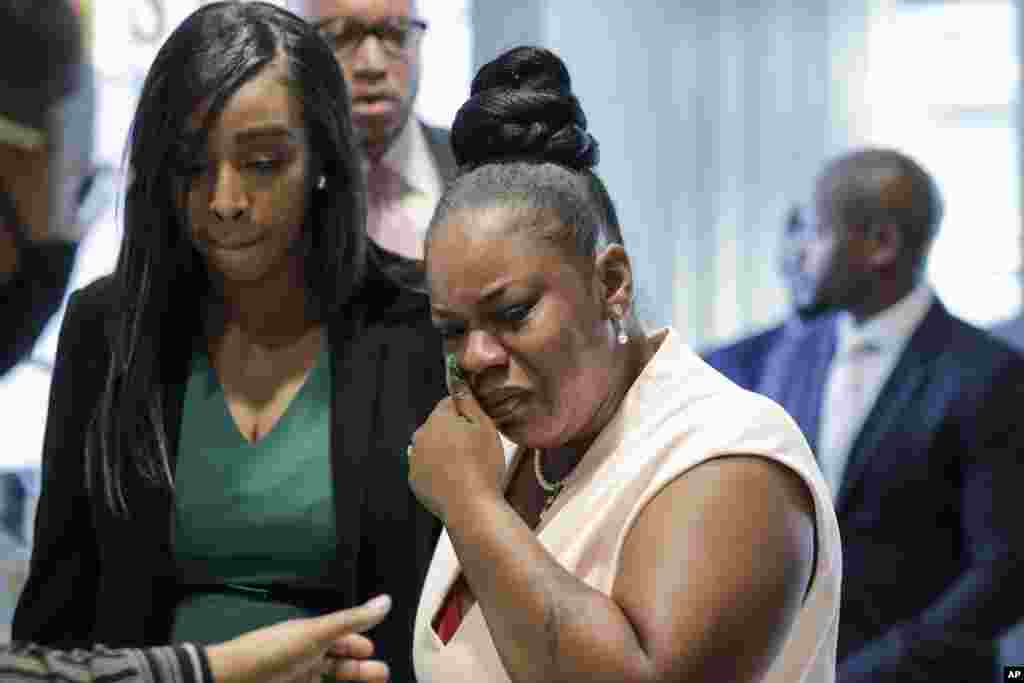 Tomika Miller, right, widow of Rayshard Brooks, cries as she leaves a news conference, June 17, 2020 in Atlanta, Georgia.&nbsp;Fulton County District Attorney Paul L. Howard Jr. announced former Atlanta Police Officer Garrett Rolfe faces charges including felony murder in the fatal shooting of Rayshard Brooks on June 12.&nbsp;
