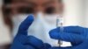 FILE - A nurse draws from a vial of Johnson & Johnson coronavirus vaccine, in Los Angeles, California, March 25, 2021. 