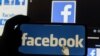 ARCHIVO - El logotipo de Facebook se muestra en un teléfono móvil en esta ilustración del 2 de diciembre de 2019.