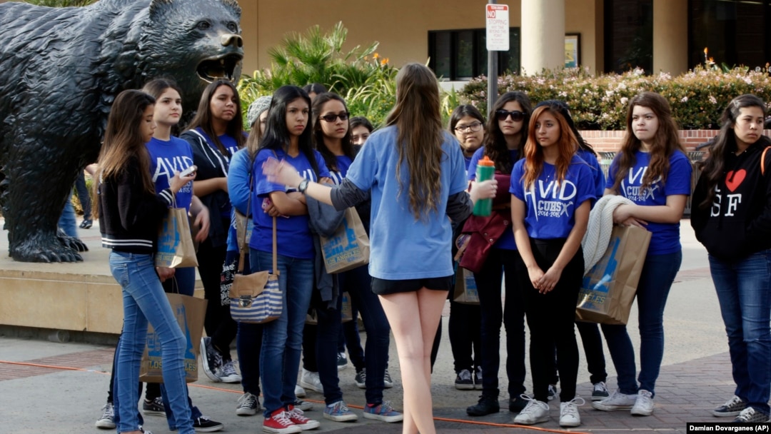  A bioengineering student leads prospective college-bound high school seniors on a campus tour in Los Angeles. Fewer California high school students have been offered admission to University of California campuses for the fall, officials reported