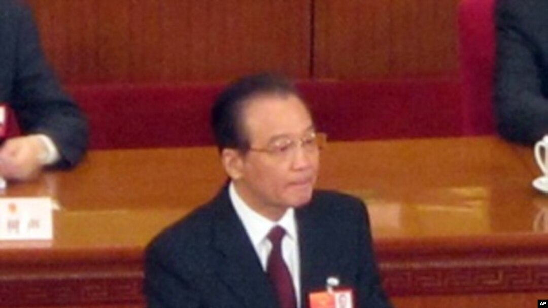 中國總理溫家寶在人大代表會議上發表政府工作報告。