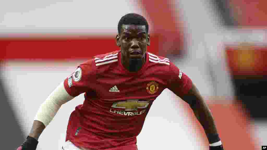 Paul Pogba, Manchester United - Midfielder Manchester United midfielder Paul Pogba was removed from the France squad for UEFA Nations League in late August after testing positive for the coronavirus. Pogba returned to training with Manchester United in mid-September following isolation. Photo: Manchester United&#39;s Paul Pogba runs with the ball during the English Premier League soccer match between Manchester United and Tottenham Hotspur at Old Trafford in Manchester, England, Sunday, Oct. 4, 2020. (Carl Recine/Pool via AP)