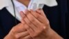 Una trabajadora de salud prepara una dosis de la vacuna CoronaVac contra el covid-19, en un centro de vacunación de Ciudad de México, el 17 de marzo de 2021.