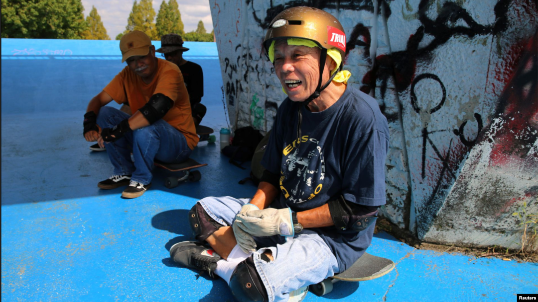 Yoshio Kinoshita takes a break during his skateboarding practice at a park in Daito, Osaka Prefecture, Japan October 6, 2021. (REUTERS/Akira Tomoshige)