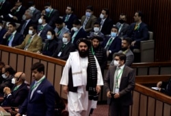 Tolibon hukumati tashqi ishlar vaziri vazifasini bajaruvchi Amir Xon Muttaqiy Islom hamkorlik tashkiloti anjumanida, Islomobod, Pokiston, 2021-yil, 19-dekabr.