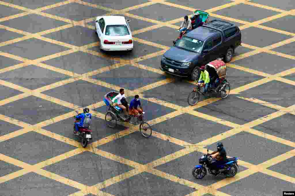 Traffic is seen as number of vehicles increase in the street after government has eased the restrictions amid concerns over coronavirus disease (COVID-19) outbreak in Dhaka, Bangladesh.