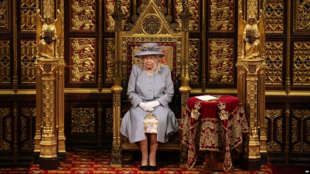 Britain's Queen Elizabeth II delivers a speech in the House of Lords during the State Opening of Parliament at the Palace of Westminster in London, May 11, 2021. (Chris Jackson/Pool via AP)