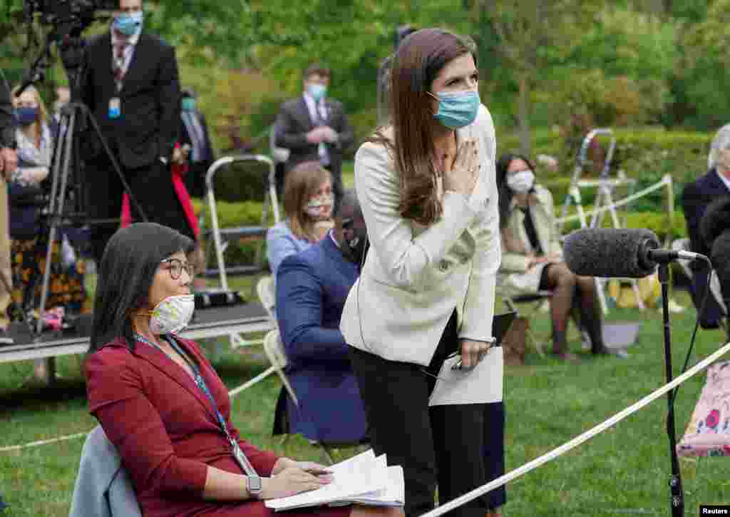 CNN White House correspondent Kaitlan Collins tries to ask her question of U.S. President Donald Trump after he called on her on the heels of an exchange with CBS News correspondent Weijia Jiang (L) during a coronavirus disease (COVID-19) outbreak&nbsp;response briefing at the White House in Washington, May 11, 2020. The president refused to hear Collins&#39; question, then ended and left the news conference.