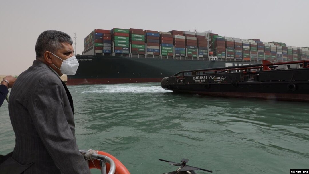 Osama Rabie, Chairman of the Suez Canal Authority, monitors the situation near stranded container ship Ever Given, one of the world's largest container ships, after it ran aground, in Suez Canal, Egypt, March 25, 2021.