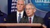 El doctor Anthony Fauci, director del Instituto Nacional de Alergias y Enfermedades Infecciosas y miembro del equipo designado por la Casa Blanca para gestionar la pandemia en EE.UU., junto al vicepresidente Mike Pence, durante una rueda de prensa celebrada el pasado 15 de marzo.