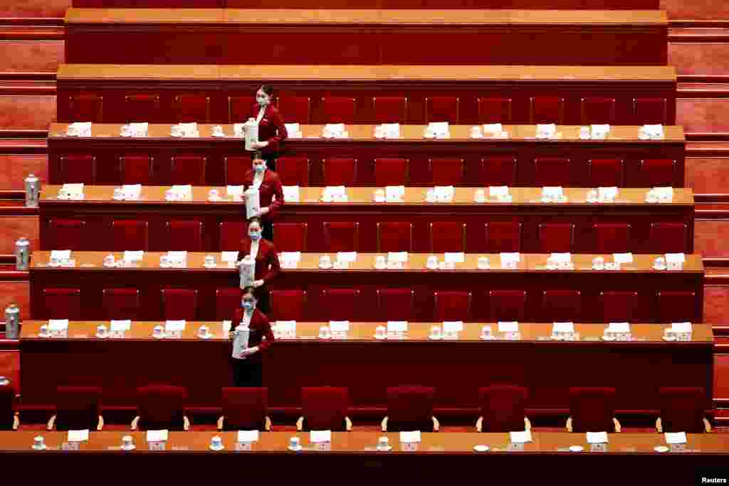 Attendants wearing face masks are seen before the second plenary session of the National People&#39;s Congress at the Great Hall of the People in Beijing, China.