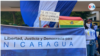 Manifestantes piden libertad, justicia y democracia en una protesta en la Universidad Centroamericana (UCA), en Managua, Nicaragua. Foto, archivo Houston Castillo, VOA.
