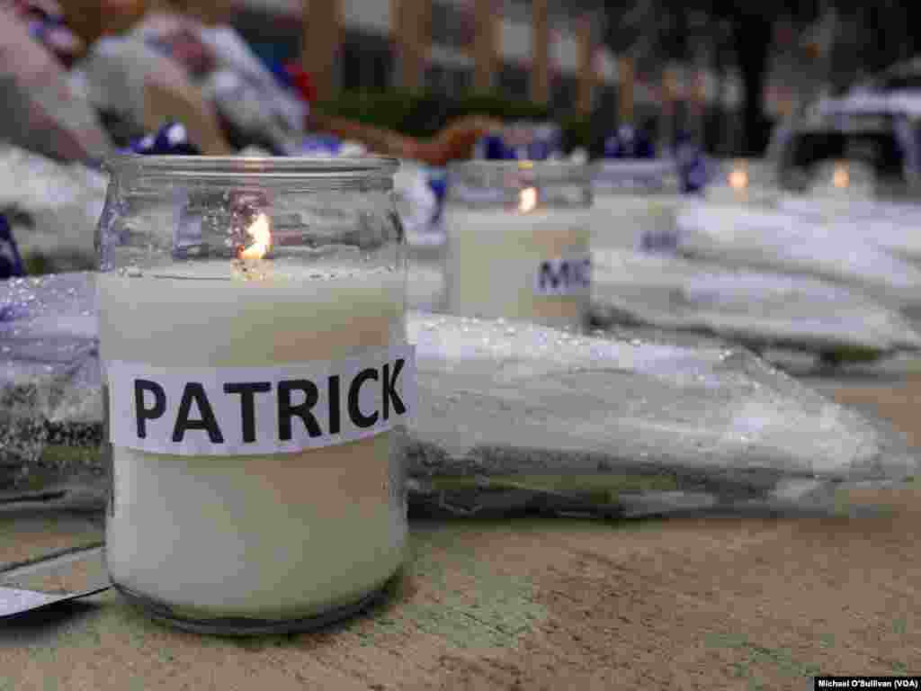 A makeshift memorial outside Dallas police headquarters honoring the officers shot in Thursday night's attack, July 9, 2016.